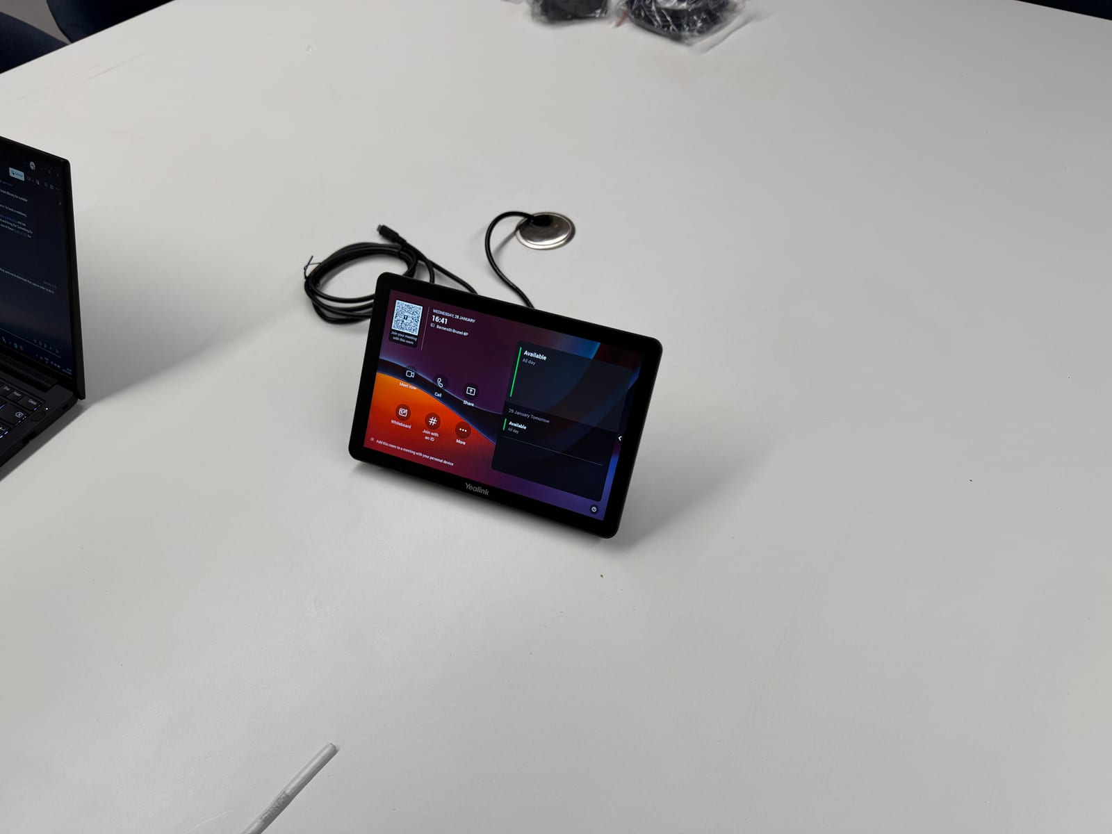 Meeting room touch controller installed on the table.