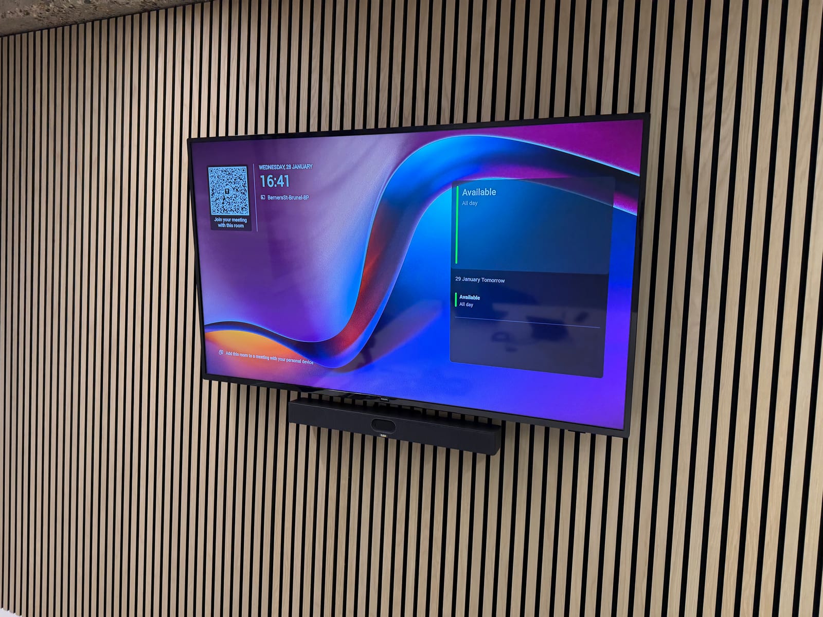 Wall-mounted meeting room display.