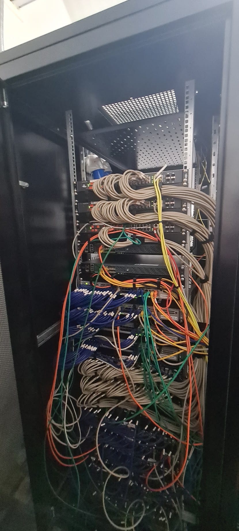 The cabinet and patch leads before the work.